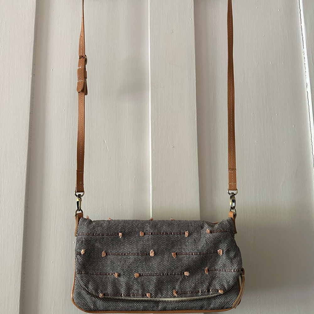 Gray and Tan Crossbody Bag with Adjustable Strap and Flap Closure